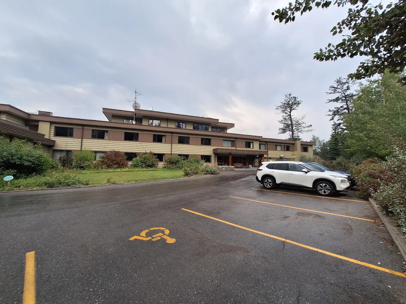 The Juniper Hotel exterior and parking area, Banff